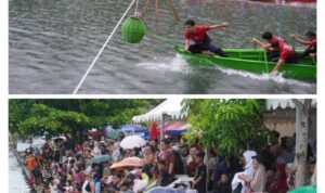 hujan-deras,-penonton-final-selaju-sampan-tak-bergeming-padati-kawasan-palinggam hujan-deras,-penonton-final-selaju-sampan-tak-bergeming-padati-kawasan-palinggam