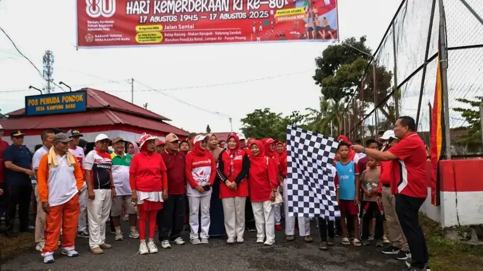 meriahkan-hut-ri,-pemdes-kampung-baru-pariaman-laksanakan-jalan-sehat