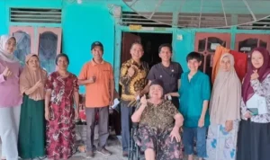 baznas-sijunjung-serahkan-bantuan-kursi-roda-untuk-warga-kurang-mampu