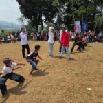 pesta-kemerdekaan-di-ciherang-peuntas,-ada-salah-gendong-istri…-hihihii.