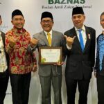 bupati-john-kenedy-azis  raih-baznas-award-2025