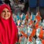 hj.-nevi-zuairina-salurkan-bantuan-bni-untuk-korban-kebakaran-pasar