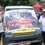 ketua-apbmi-sumbar-hm-tauhid-kenang-jembatan-gantung-saat-salurkan-800-paket-sembako