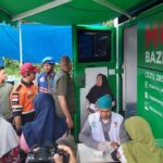baznas-gerak-cepat, -2.500-porsi-makanan-hangat-siap-saji-untuk-korban-bencana-agam