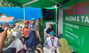 baznas-gerak-cepat, -2.500-porsi-makanan-hangat-siap-saji-untuk-korban-bencana-agam