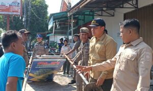 sikat-pelanggar-fasum,-satpol-pp-padang-tertibkan-bangunan-berkanopi-hingga-pengepul-di-badan-jalan