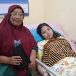 Wulia Indriani, peserta JKN yang terbantu biaya operasi caesar darurat di RSIA Sayang Ibu Batusangkar.