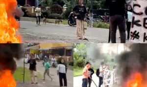Sejumlah emak-emak memadamkan api dari ban bekas yang dibakar pendemo di depan Rutan Kelas IIB Padang.